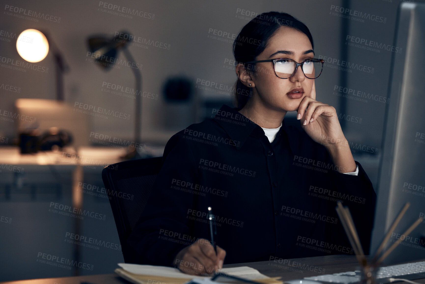 Buy stock photo Woman, night office and writing at computer for seo planning, research or agenda in dark startup. Female working overtime on desktop technology, online notes and network data for internet analytics