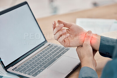 Buy stock photo Laptop, office and business woman with wrist pain, injury or accident while working on a project. Stress, medical emergency and professional female with a sprain muscle on a computer in the workplace