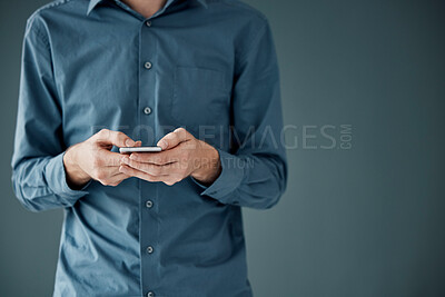 Buy stock photo Man hands, phone app and mobile networking of a businessman in a office on web. Online communication, text writing and technology of a social media writer employee with mock up and blurred background