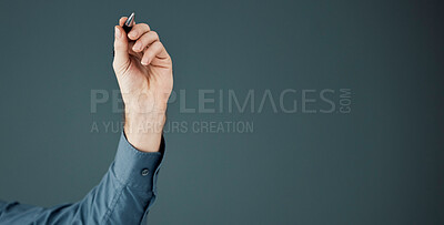 Buy stock photo Business, mockup and hand with pen, space and ideas for opportunity, logo and brand development on dark studio background. Arm, corporate and man make notes, space and product placement on backdrop