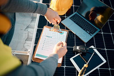 Buy stock photo Planning, solar panels and checklist with hands of man for engineering, sustainability and renewable energy. Writing, inspection and industry with engineer and installation on roof for electricity