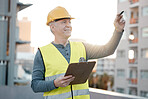 Tablet, city and man construction worker working on building for maintenance, renovation or repairs. Leadership, contractor and senior male industry worker at a town site with a digital mobile device