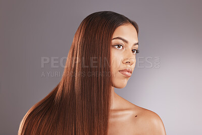 Buy stock photo Face, beauty and hair with a model black woman in studio on a gray background for natural treatment. Aestehtic, salon and haircare with an attractive young female posing to promote keratin benefits