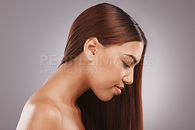 Buy stock photo Face, salon and hair with a model black woman in studio on a gray background for natural treatment. Aesthetic, beauty and haircare with an attractive young female posing to promote keratin benefits