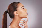 black woman, face profile and skincare with salon hair aesthetic for wellness and self care. Isolated, gray background and studio with person with healthy hairstyle and dermatology feeling skin glow 