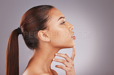 Buy stock photo Black woman neck, face profile and skincare with antiaging aesthetic for wellness and self care. Isolated, gray background and studio with person with healthy dermatology feeling skincare glow 