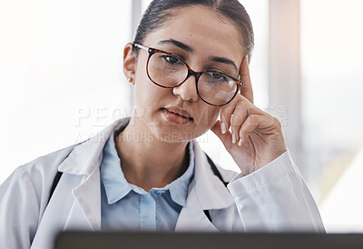 Buy stock photo Tired doctor, laptop or woman medical student reading online credit debt, email or university outstanding bills. Financial crisis, sad or nurse face on tech for hospital payment agenda or compliance