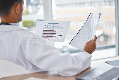Buy stock photo Doctor or man reading medical documents relax in office for surgery, medicine or healthcare charts for feedback. Paper, research or nurse with insurance, hospital contract or health report review