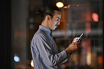 Phone, night and communication with a business man in his office, working late to make a global deadline. Mobile, contact and networking with a male employee at work using a smartphone app to email