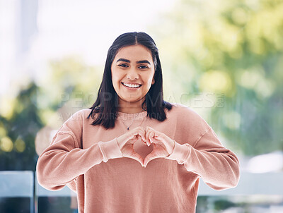 Buy stock photo Portrait, heart hands and young woman for self care, cardiology wellness and gen z support for women health. Face of a happy Indian person with love emoji, sign or gesture for like, vote and peace
