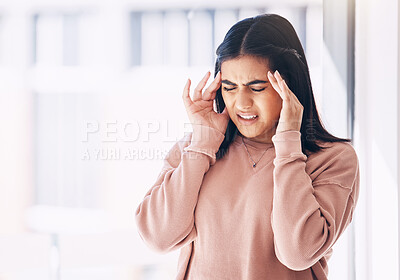 Buy stock photo Headache, stress or mockup with an indian woman on a blurred background suffering from pain or anxiety. Compliance, mental health or burnout and a frustrated young female struggling with a migraine