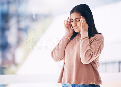 Buy stock photo Headache, burnout or mockup with an indian woman on a blurred background suffering from pain or stress. Compliance, mental health or anxiety and a frustrated young female struggling with a migraine