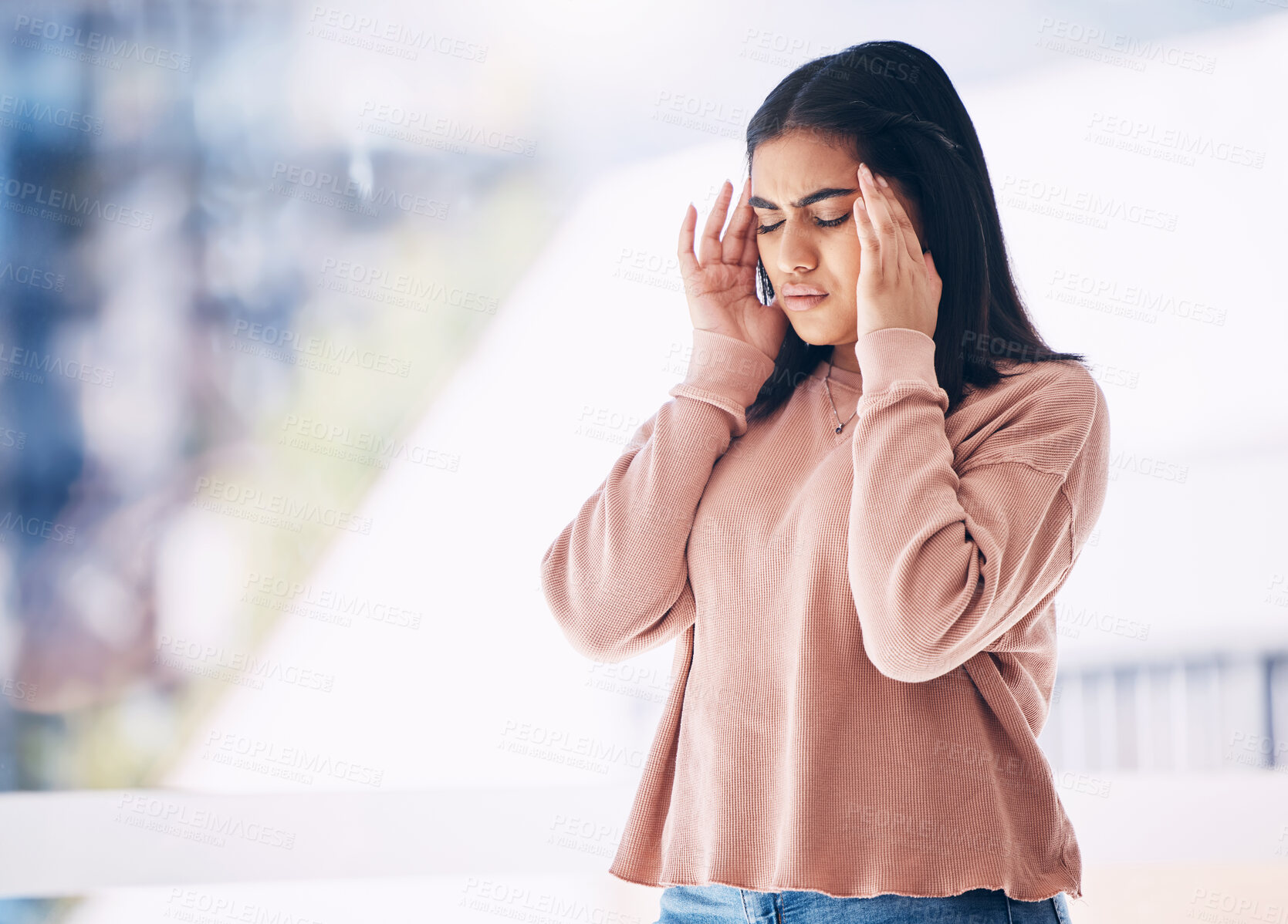 Buy stock photo Headache, burnout or mockup with an indian woman on a blurred background suffering from pain or stress. Compliance, mental health or anxiety and a frustrated young female struggling with a migraine