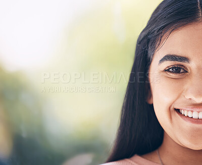 Buy stock photo Portrait, face and mockup with an indian woman outdoor standing on a bokeh green background closeup. Half, happy and smile with an attractive young female posing on blank mock up space for branding