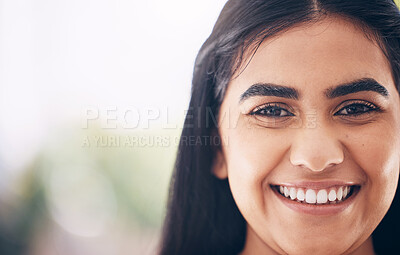 Smile, happy and portrait of a beautiful woman with mockup space, success and vision at a company. Business, work and face of an Indian employee at a corporate agency with happiness and excited