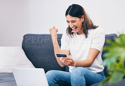 Success, laptop or woman excited with credit card or digital payment in celebration on sofa at home. Wow, finance or happy girl celebrates online shopping subscription discount, sales offer or deal