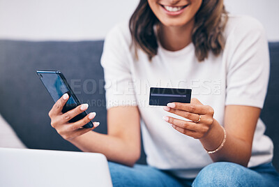 Buy stock photo Ecommerce, hands or woman with credit card or phone for a digital payment on sofa relaxing at home. Smile, finance or happy girl online shopping for subscription sales offer, banking or fintech deal 