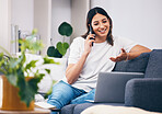 Woman, phone call and laptop on sofa for idea with smile in conversation or discussion at home. Happy female freelancer in communication on smartphone with computer relaxing on living room couch