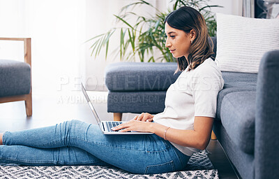 Buy stock photo Entrepreneur, woman on floor and laptop in living room, typing and connection for social media, break and relax. Business owner, female and girl with device, digital planning or in lounge for comfort