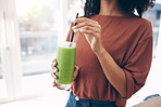 Hands, smoothie and straw with a black woman drinking a health beverage for a weight loss diet or nutrition. Wellness, mock up and drink with a healthy female enjoying a fruit beverage at home