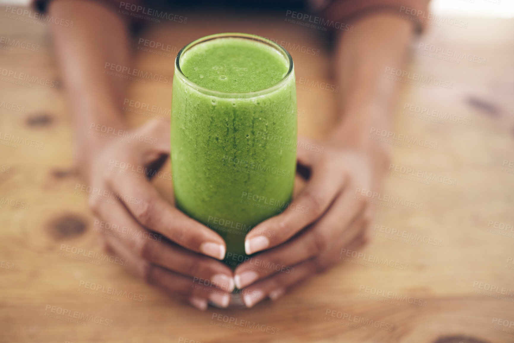 Buy stock photo Hands, glass and smoothie with a black woman holding a health beverage for a weight loss diet or nutrition. Wellness, detox or drink with a healthy female enjoying a fresh fruit and mint juice