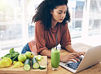 Research, smoothie and health with black woman and laptop for blog, salad and vegetables. Nutritionist, diet and food with girl by kitchen counter for cooking, technology and learning at home