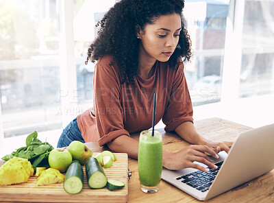 Buy stock photo Research, smoothie and health with black woman and laptop for blog, salad and vegetables. Nutritionist, diet and food with girl by kitchen counter for cooking, technology and learning at home