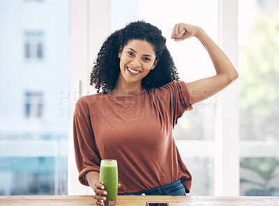 Buy stock photo Portrait, muscle and smoothie with a black woman in the kitchen of a home flexing her bicep for health. Wellness, weight loss and strong with an attractive young female drinking a diet beverage