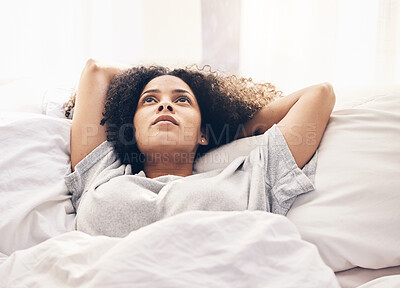 Buy stock photo Black woman, morning and thinking in home bedroom after sleeping or resting. Peace, bed relax and comfort of young female lost in thoughts, focus or contemplating ideas after waking up in house alone