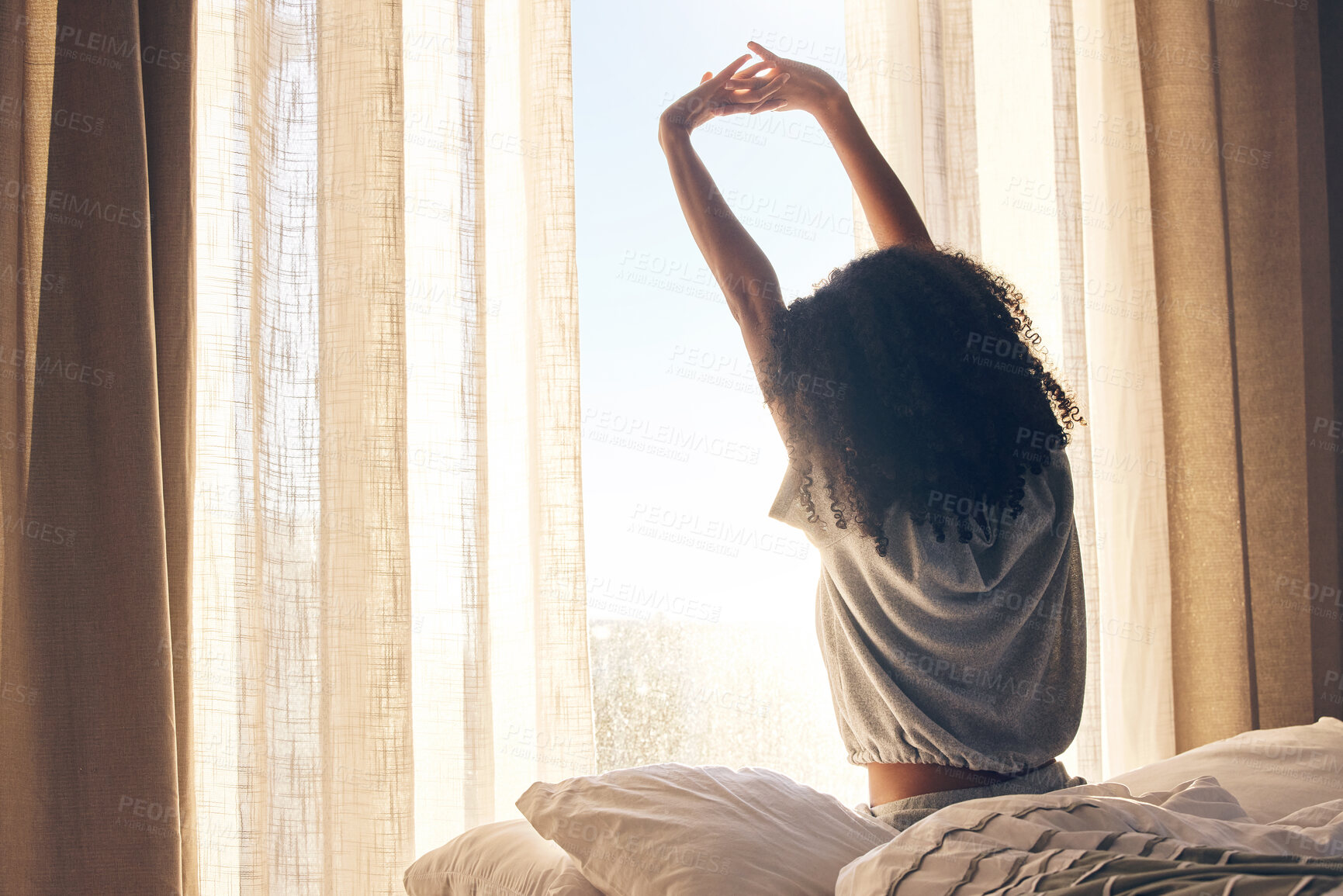 Buy stock photo Black woman, back stretching and waking up in home bedroom after sleeping or resting. Relax, peace and comfort of female stretch after feeling fresh, awake and well rested to start morning in bed.