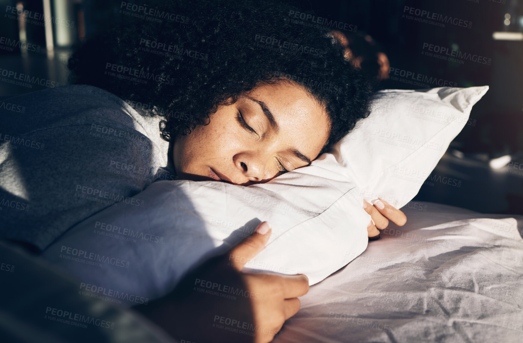 Buy stock photo Black woman, sleeping and pillow in morning for peace, quiet and rest or relax in home bedroom. Person on bed to dream or for calm sleep with sleepy or stress relief for health and wellness