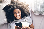 Black woman, phone and top view in home bedroom for social media, texting or internet browsing in the morning. Portrait, bed relax and female with mobile smartphone for web scrolling or networking.