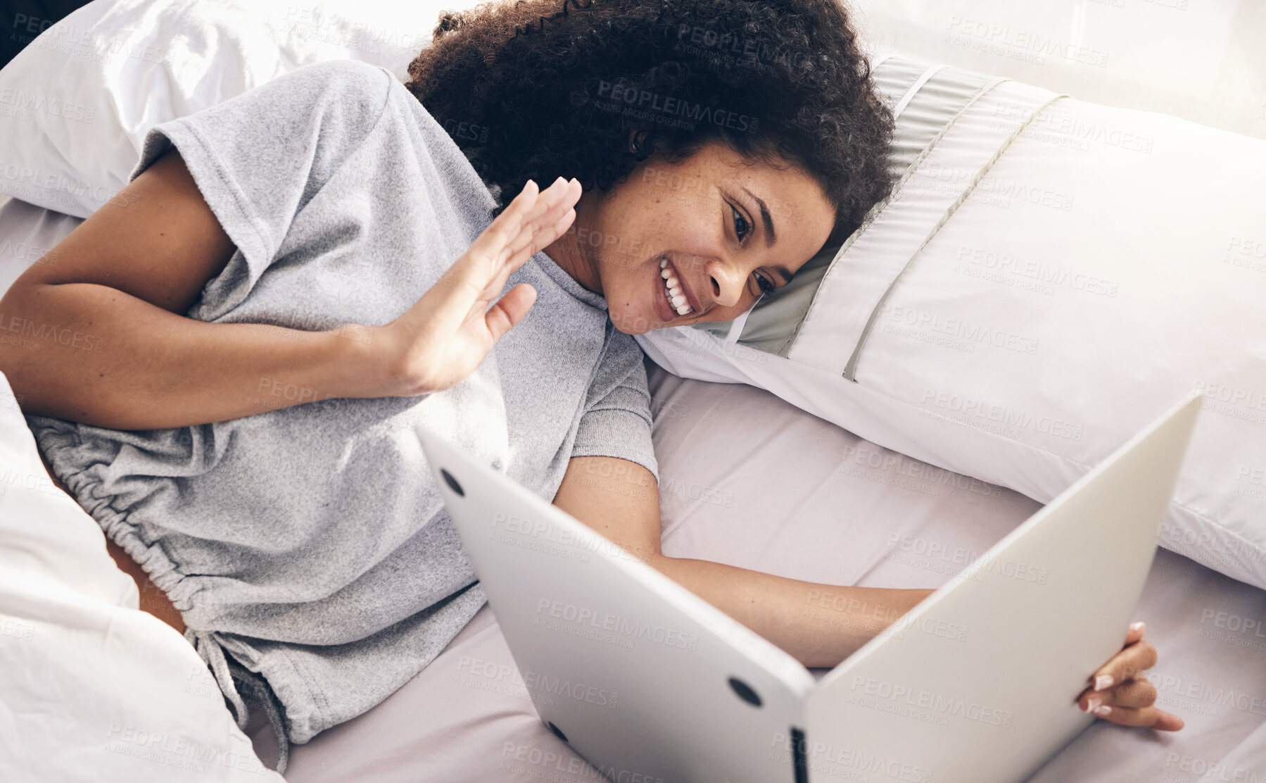 Buy stock photo Laptop, video call and woman wave in bed in bedroom for online chat in the morning. Technology, communication and top view of black female waving on videocall while talking to contact with computer.