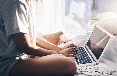 Buy stock photo Hands, laptop and typing in bed in bedroom for social, media or internet browsing in the morning. Digital technology, remote worker and woman working on project, writing email or research on computer