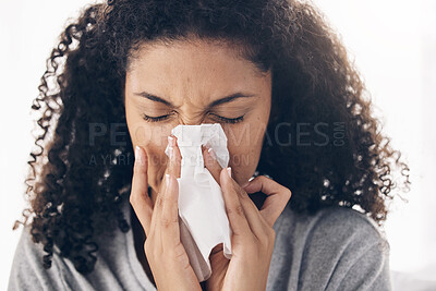 Buy stock photo Black woman, tissue and sneeze of a sick young person blowing nose with toilet paper for safety. Flu, fever and cold of a female feeling tired from sirus infection at home with a health problem 