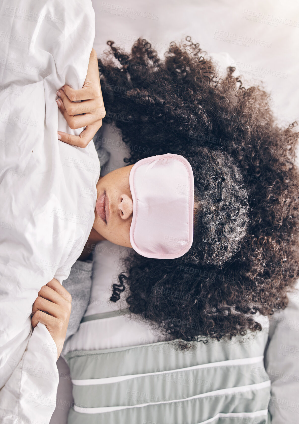 Buy stock photo Relax, beauty sleep and black woman with eye mask in bed, dream and refresh body and mind in apartment from above. Dreaming, rest and relaxation, girl sleeping late on weekend morning in cozy bedroom