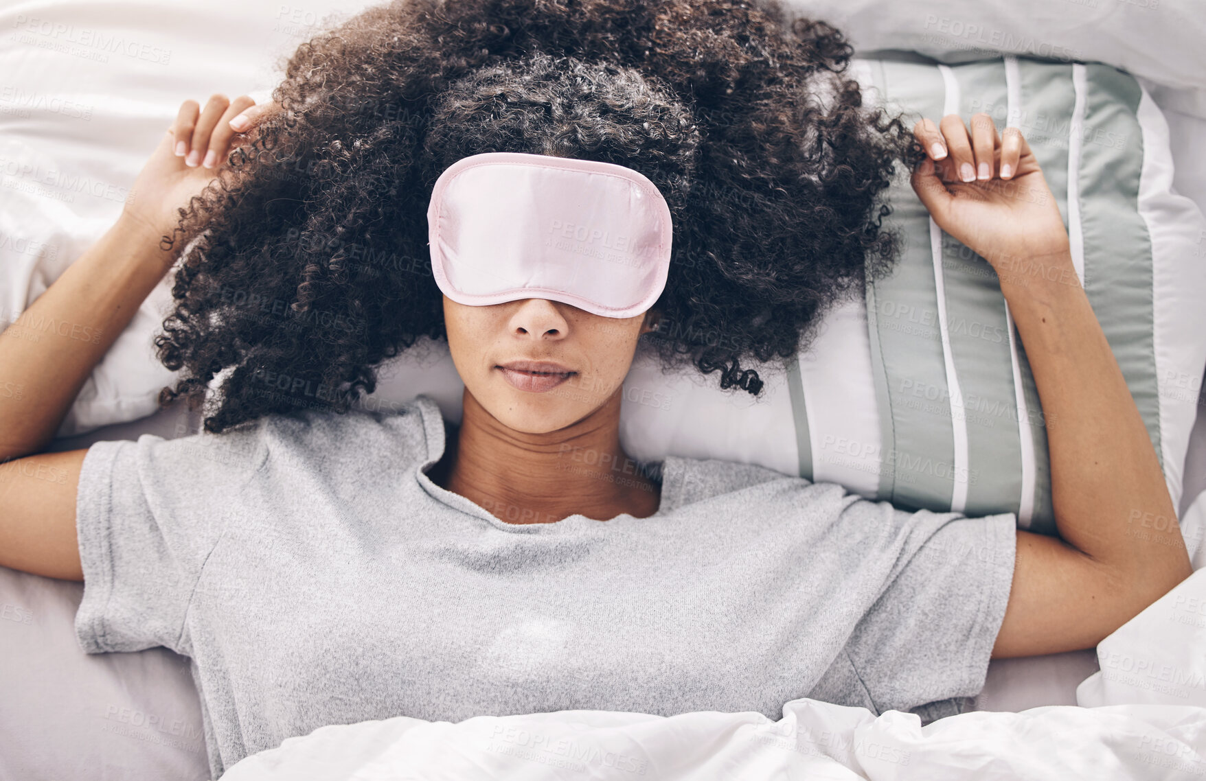 Buy stock photo Sleep, relax and black woman in bed with eye mask, dream and rejuvenate body and mind in apartment or hotel. Dreaming, rest and relaxation, tired girl sleeping late on weekend morning in cozy bedroom