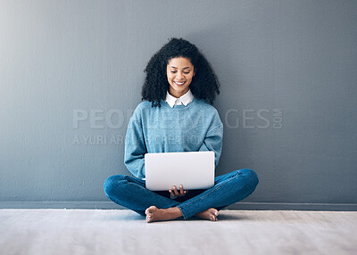Buy stock photo Laptop, smile and search with black woman on floor for social media, news and designer on wall mockup. Website, online shopping and technology with girl for communication, internet and digital