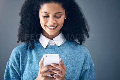 Buy stock photo Phone, mockup and black woman in studio for internet, search or social media on grey background. Online, communication and girl texting on space, smartphone or copy space for website, app or reading