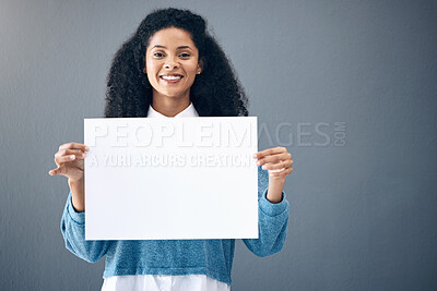 Buy stock photo Portrait, mockup and black woman with poster for space, advertising and branding on grey background. Face, blank or billboard sign by girl relax on mock up, copy or announcement on product placement
