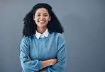 Portrait, fashion and style by black woman smile, excited and happy isolated against a studio gray background. Female, confident and person arms crossed with mockup space and positive mindset