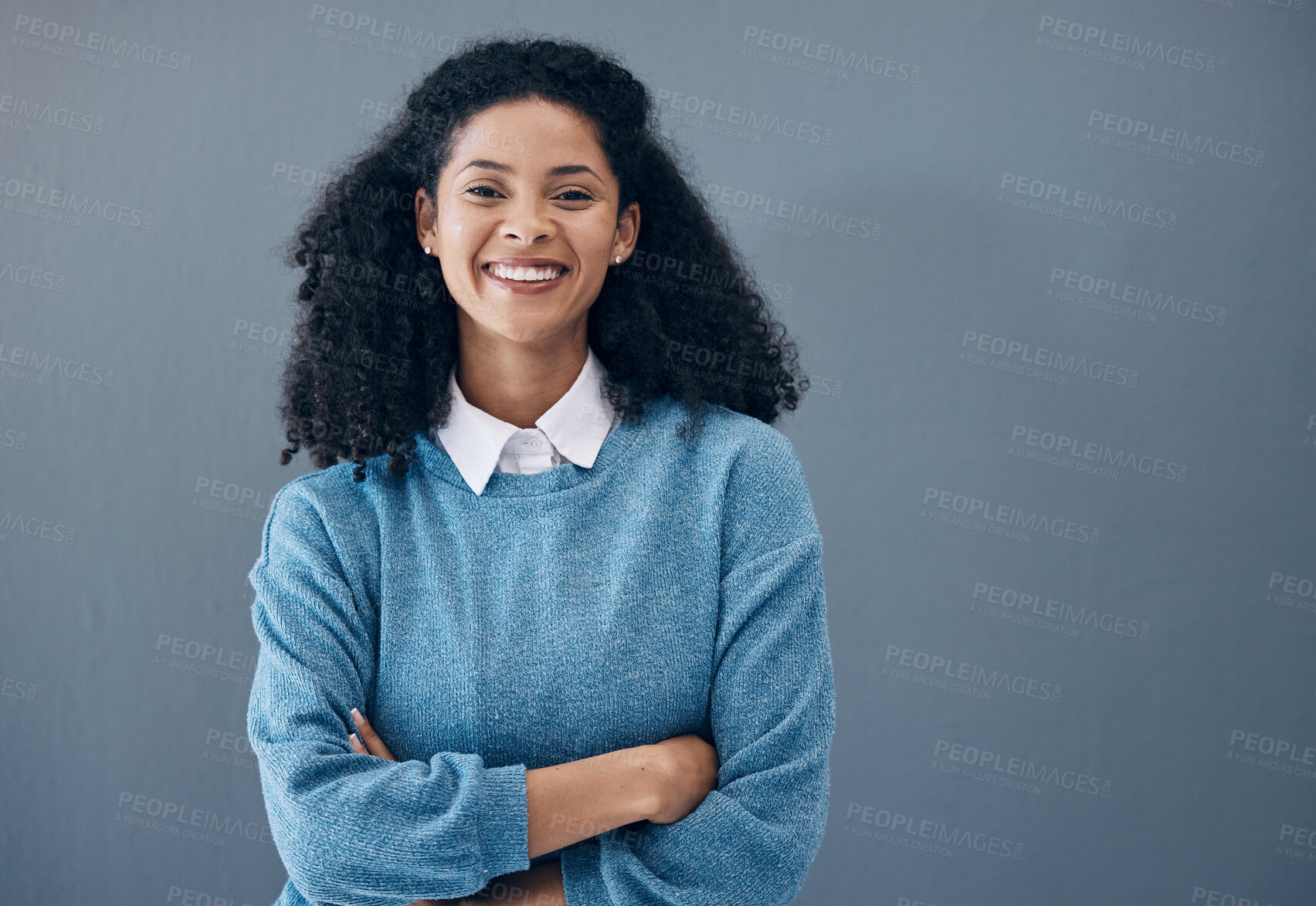 Buy stock photo Portrait, fashion and style by black woman smile, excited and happy isolated against a studio gray background. Female, confident and person arms crossed with mockup space and positive mindset