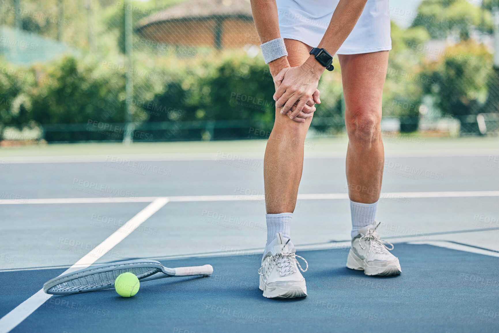 Buy stock photo Tennis court, woman knee injury and training outdoor for fitness, health or wellness by blurred background. Summer, sports and exercise with pain in legs at game, contest or competition in sunshine