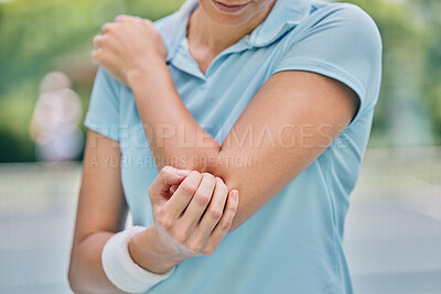 Buy stock photo Sports, woman and injury with elbow, pain and muscle strain while training, workout and outdoor fitness. Female, lady and athlete with emergency for arm, inflammation and broken bone while on court