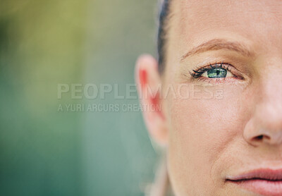 Buy stock photo Half, face and portrait of a woman at tennis with vision, motivation and serious about a game. Mockup, focus and sports player looking serious while playing sport on a court and bokeh background