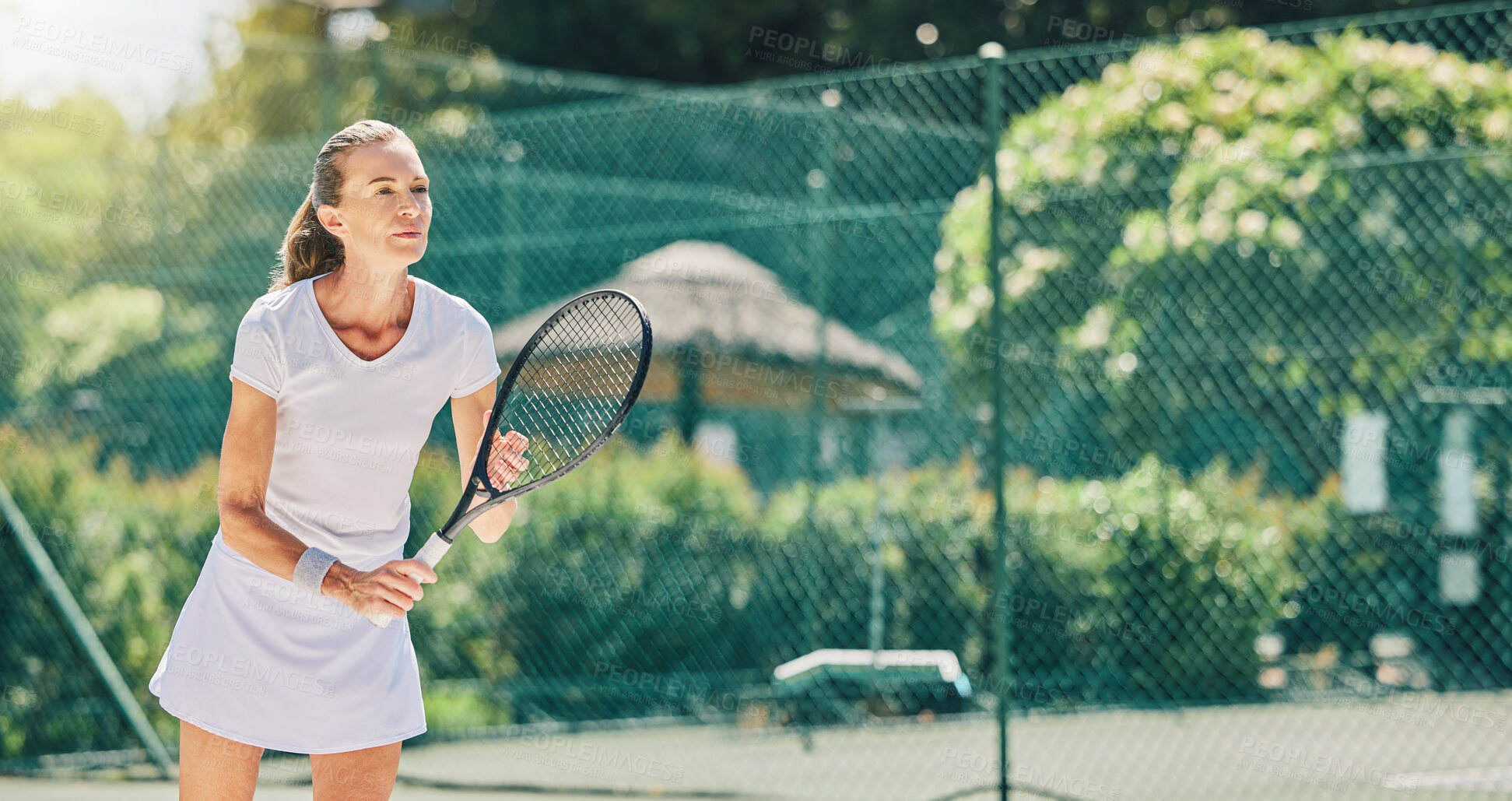 Buy stock photo Senior woman, tennis player and ready in sports game for match or hobby on the court. Elderly female in sport fitness holding racket in stance for training or practice in the outdoors on mockup