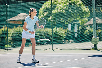 Woman, sports and tennis court with racket ready in sports game for ball, match or hobby with smile. Happy female in sport fitness holding racquet in stance for training or practice in the outdoors