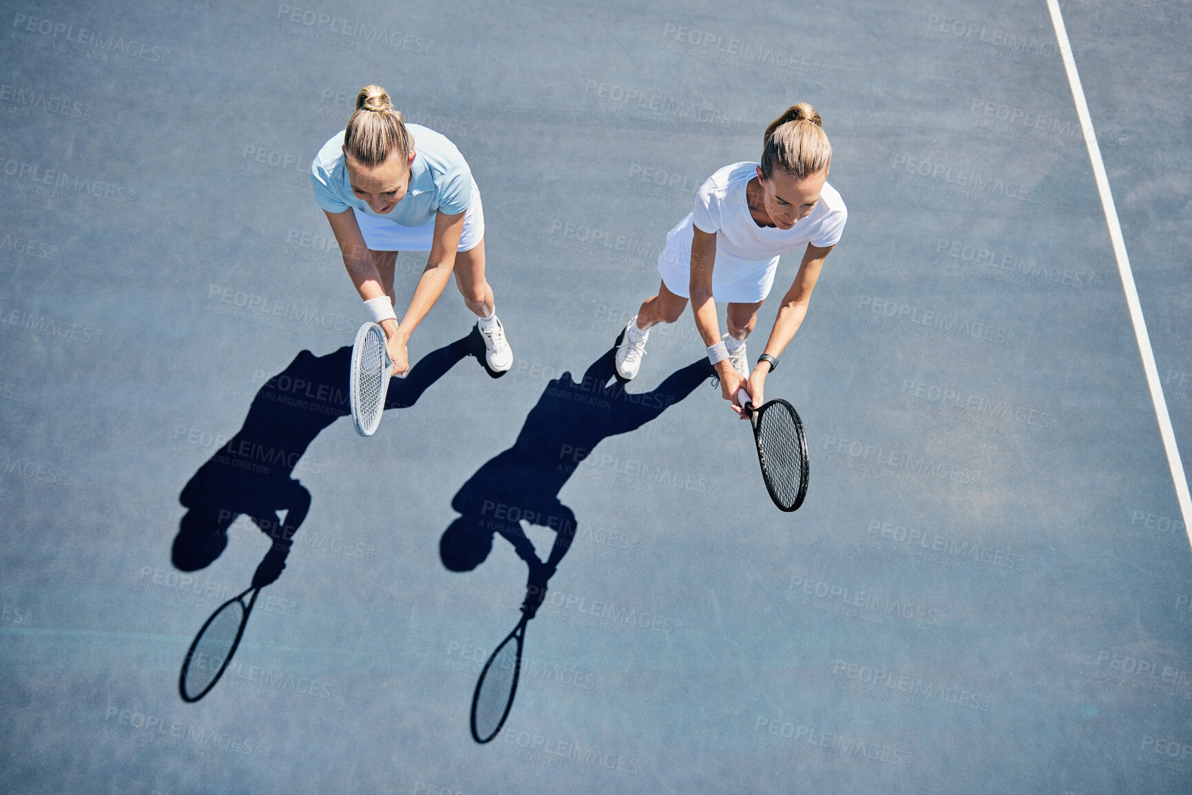 Buy stock photo Woman, tennis and friends in team match, game or sports together standing ready above on the court. Women in fitness sport, competition or club with racket stance for teamwork, exercise or training