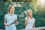 Tennis, women friends and sports on outdoor court for fitness, exercise and training. Healthy people or team talking at club about game, workout and performance for health and wellness with cardio