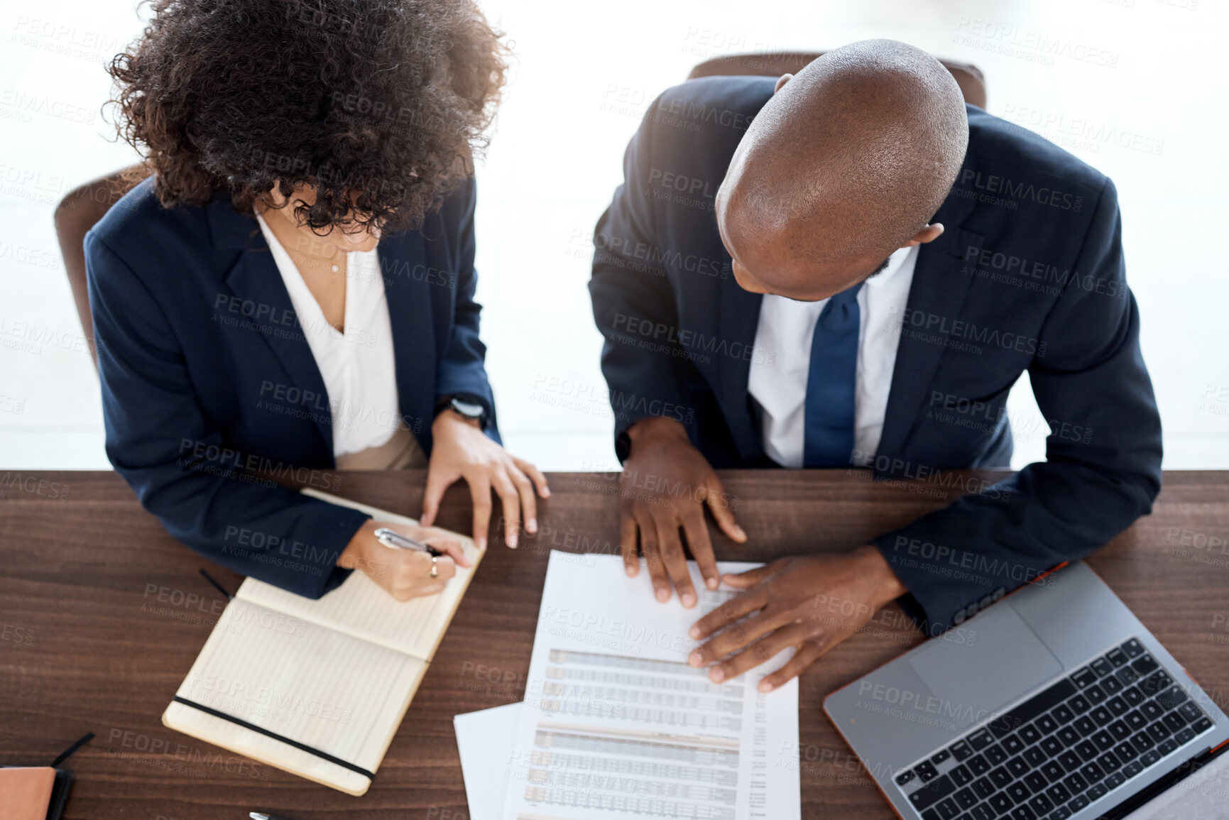 Buy stock photo Lawyer, consulting and documents with a business team working on a desk in an office from above. Contract, meeting or financial advisor with a man and woman employee at work in collaboration